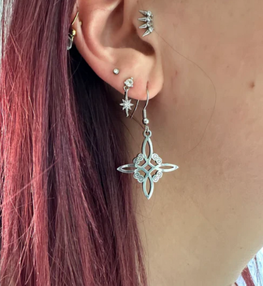 Boucle d'oreille noeud de sorcière ensorcelé